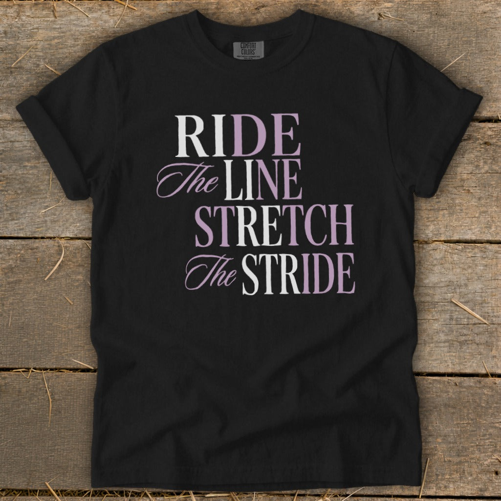 Black t-shirt with "RIDE The LINE STRETCH The STRIDE" text in purple and white.