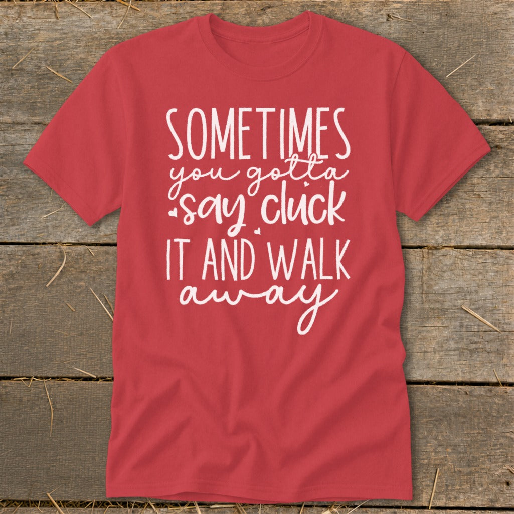 Red t-shirt with white text reading "Sometimes you gotta say cluck it and walk away."
