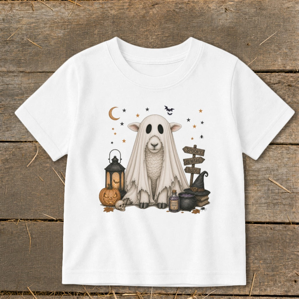 Sheep dressed as a ghost with Halloween decorations.