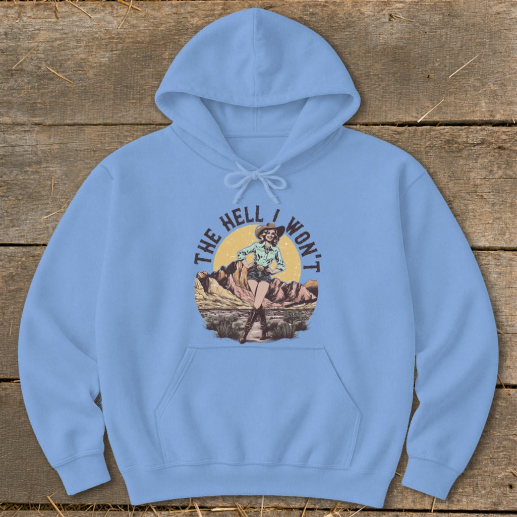 Light blue hoodie with graphic of cowgirl and text "The Hell I Won't".
