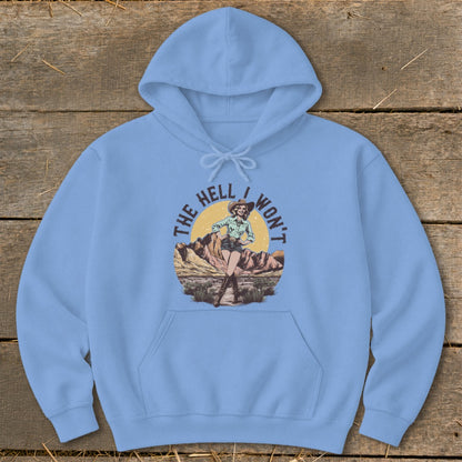 Light blue hoodie with graphic of cowgirl and text "The Hell I Won't".