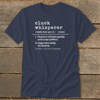 Navy t-shirt with "cluck whisperer" dictionary definition and chicken-related humor.