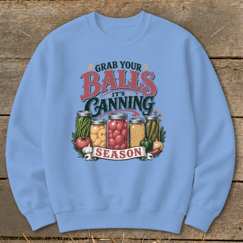 Grab your balls, it's canning season text with jars of vegetables on a blue sweatshirt.