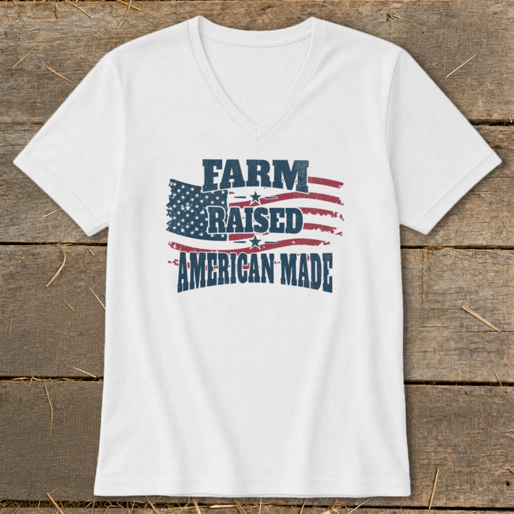 White v-neck t-shirt with distressed American flag graphic and text "FARM RAISED AMERICAN MADE".