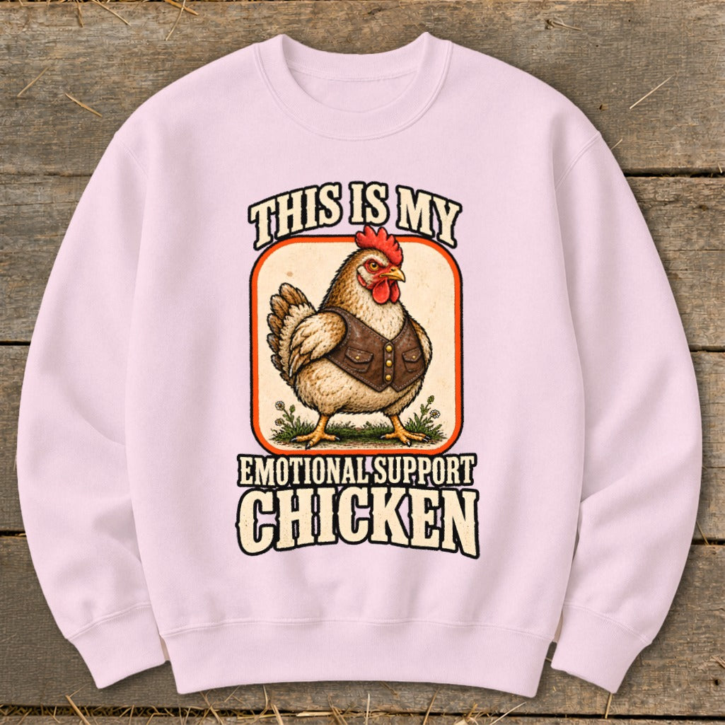 Pink sweatshirt with a graphic of a chicken wearing a vest and text "THIS IS MY EMOTIONAL SUPPORT CHICKEN".