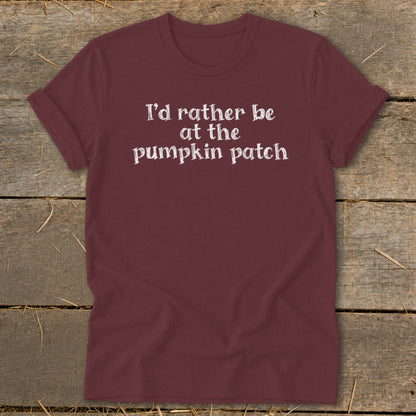 Maroon t-shirt with white text reading "I'd rather be at the pumpkin patch".