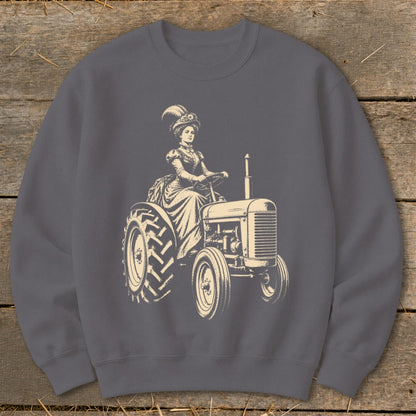 Cream illustration of a woman in a vintage dress and hat driving a tractor.