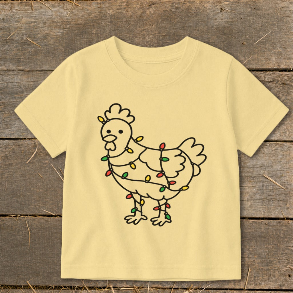 Light yellow t-shirt with a chicken graphic wrapped in colorful Christmas lights.
