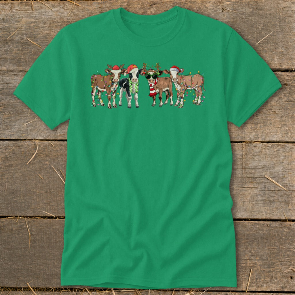 Five cartoon cows wear Santa hats and Christmas lights.
