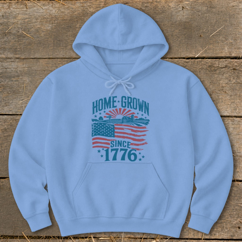 Light blue hoodie with "Home Grown Since 1776" graphic and American flag.