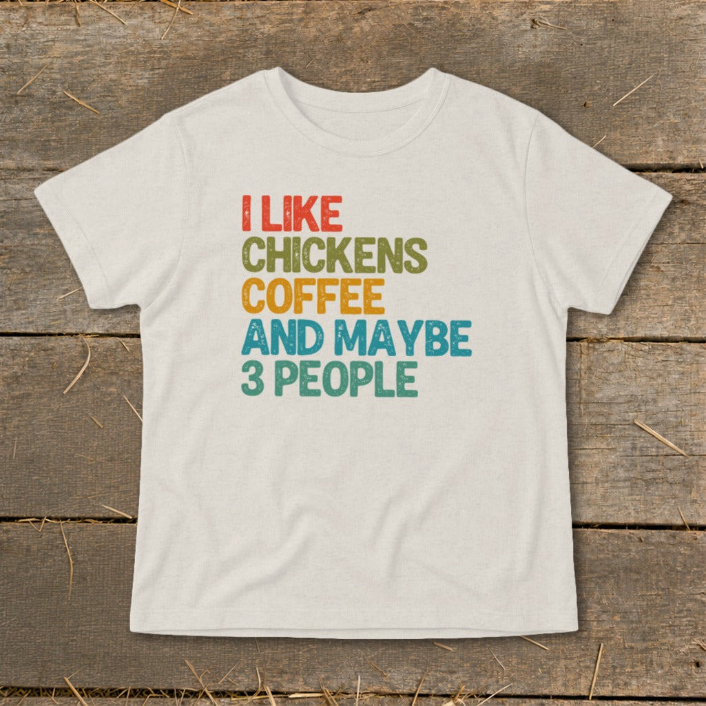 Cream t-shirt with vintage text: I Like Chickens Coffee And Maybe 3 People.