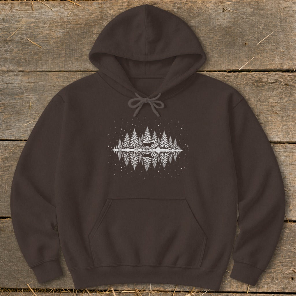 Brown hoodie with a reflected forest, deer, and snowflake graphic design.