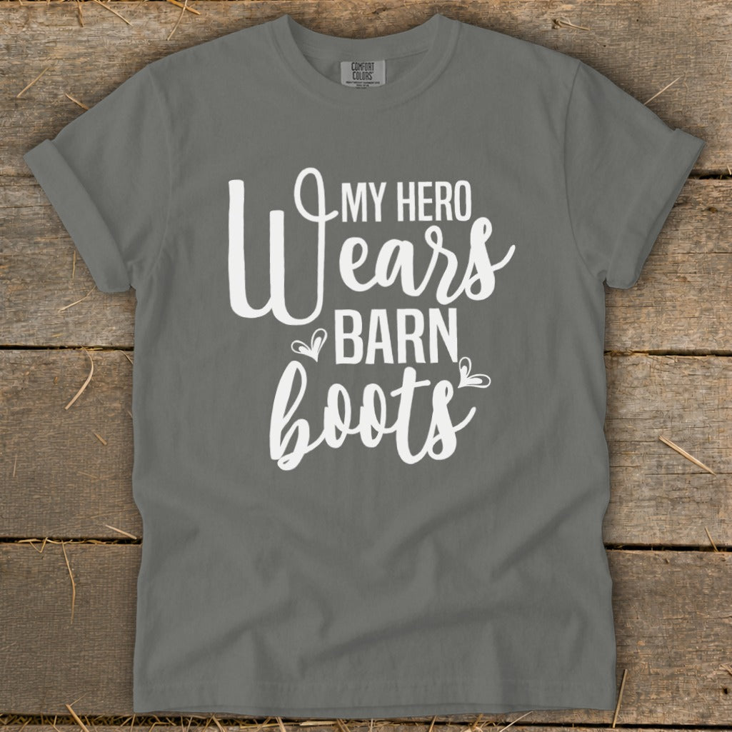 Grey t-shirt with white text "My hero wears barn boots"