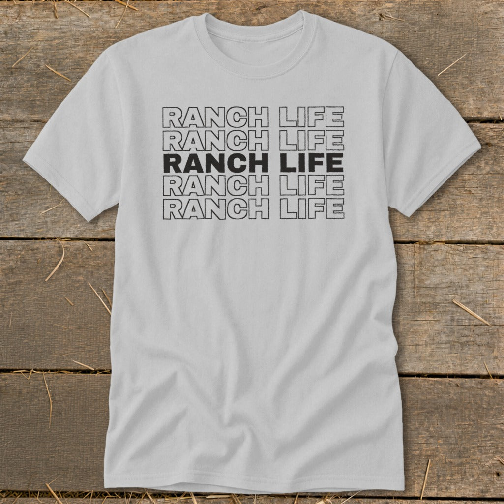 Light gray crewneck t-shirt featuring stacked outline text reading RANCH LIFE with one solid black row.