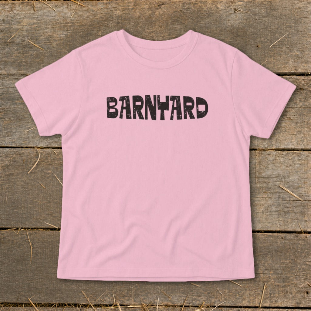 Pink short-sleeved t-shirt with the word BARNYARD printed in black block letters across the chest.