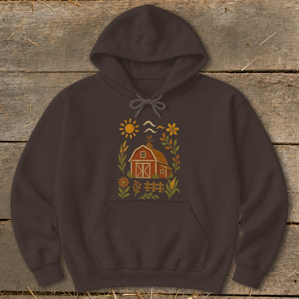 Brown hoodie with a rustic barn and floral graphic on the front.