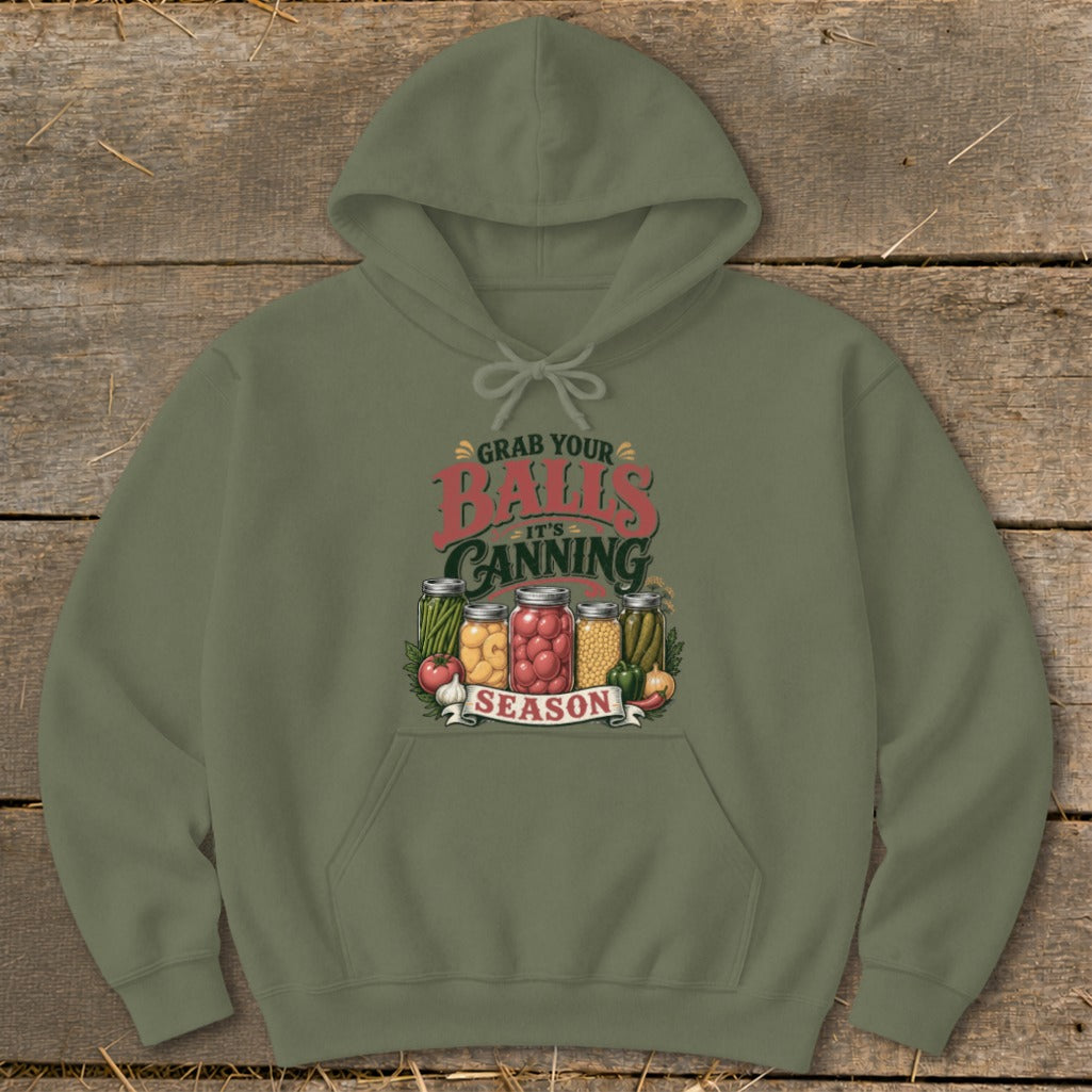 Olive green hoodie with "Grab Your Balls It's Canning Season" graphic and jars of food.