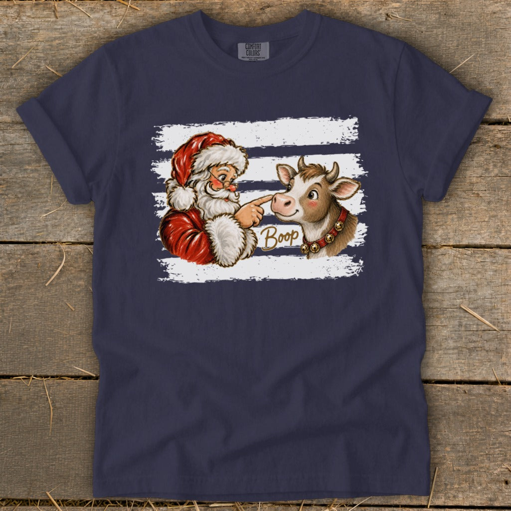 Santa booping a cow with the word "Boop" on a navy blue shirt.