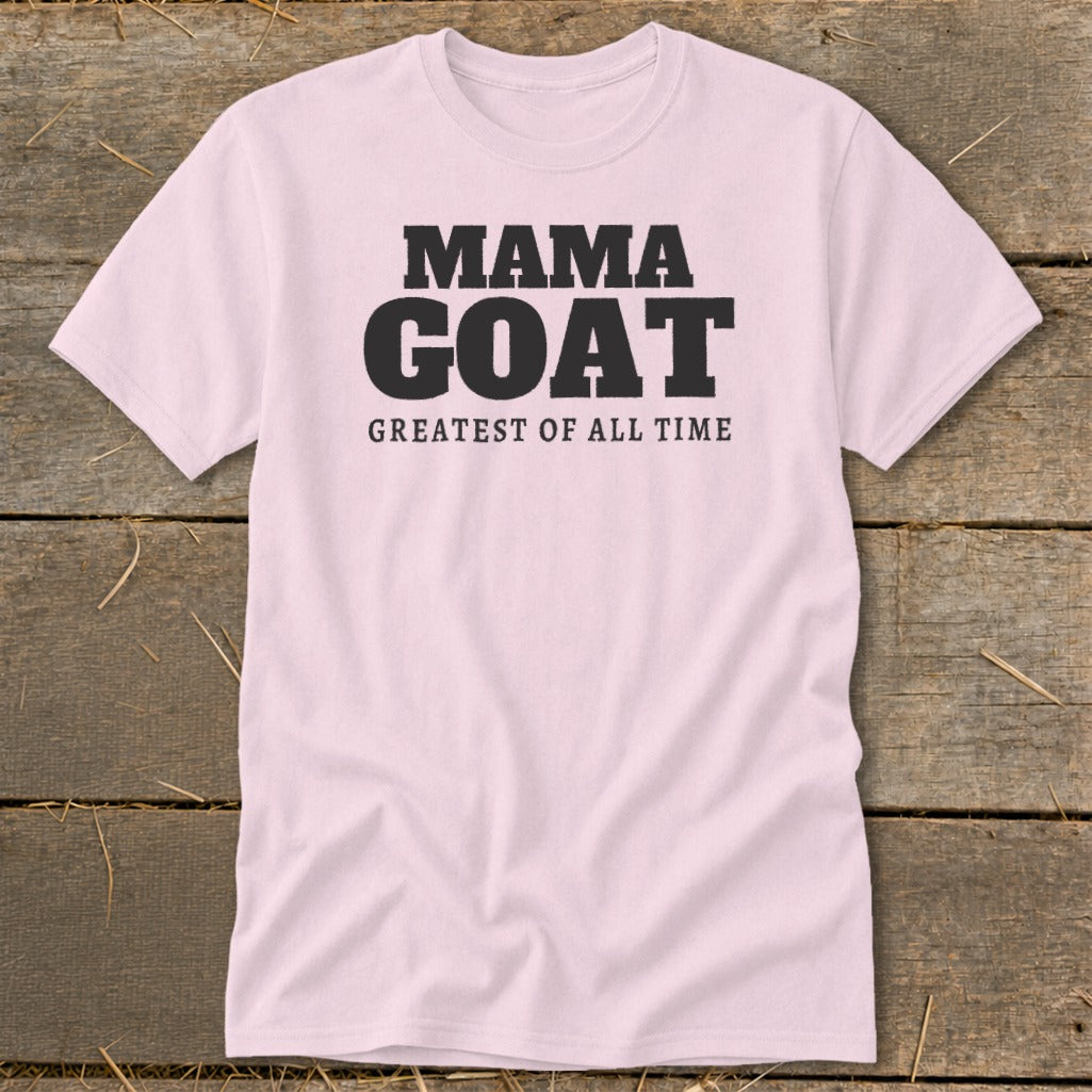 Light pink t-shirt with black text reading "MAMA GOAT GREATEST OF ALL TIME".
