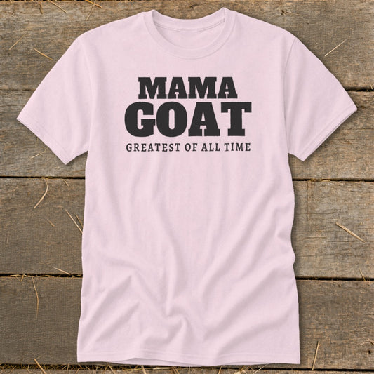 Light pink t-shirt with black text reading "MAMA GOAT GREATEST OF ALL TIME".