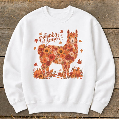 White sweatshirt with a floral llama and "Pumpkin Season" text.