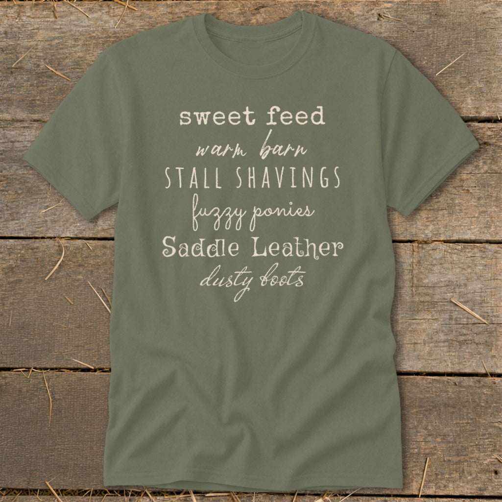 Olive green t-shirt with list of phrases in white script font.