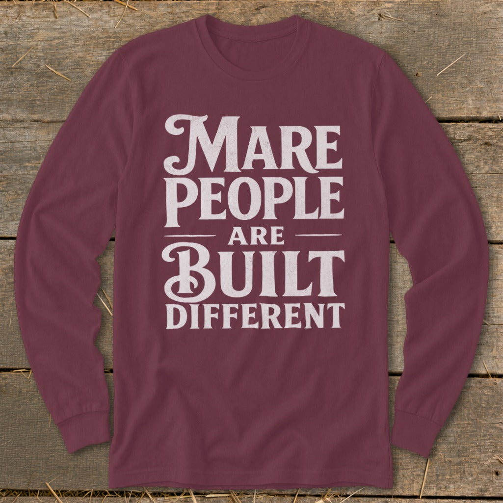 Maré People Are Built Different text on maroon long-sleeve shirt.