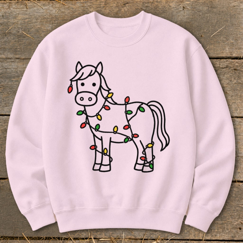 Pink sweatshirt with a line drawing of a horse decorated with colorful Christmas lights.