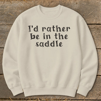 Cream sweatshirt with black text reading "I'd rather be in the saddle."