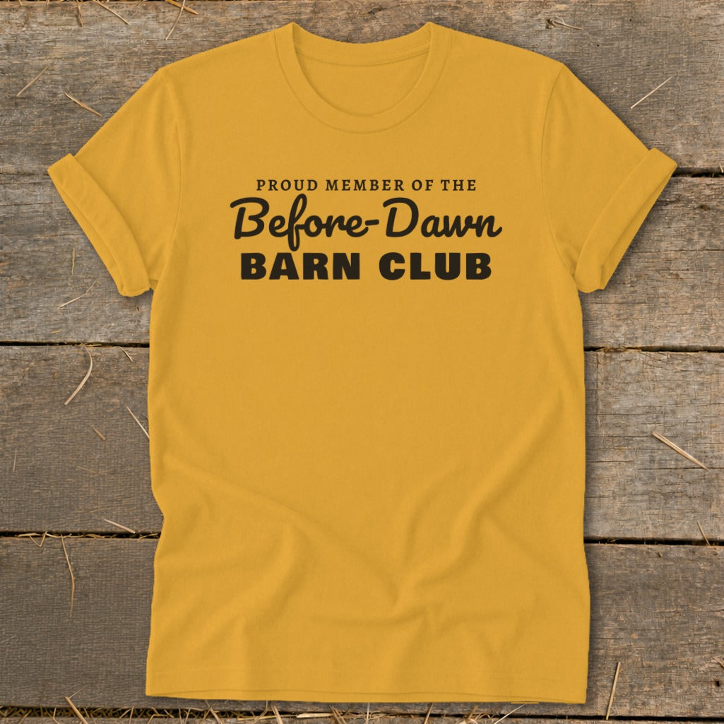Yellow t-shirt with black text reading "Proud Member of the Before-Dawn Barn Club."