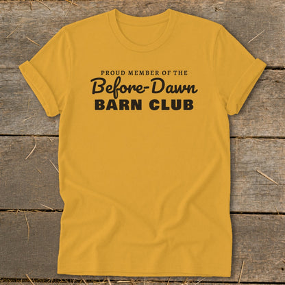 Yellow t-shirt with black text reading "Proud Member of the Before-Dawn Barn Club."