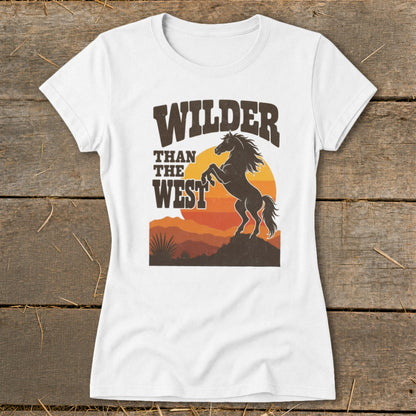 White t-shirt with "WILDER THAN THE WEST" text and a rearing horse.