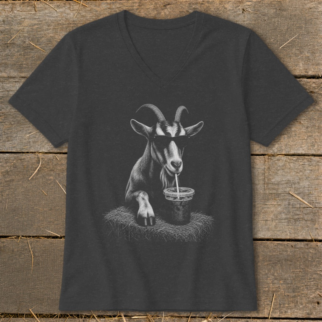 Goat wearing sunglasses drinks from a cup on a t-shirt.