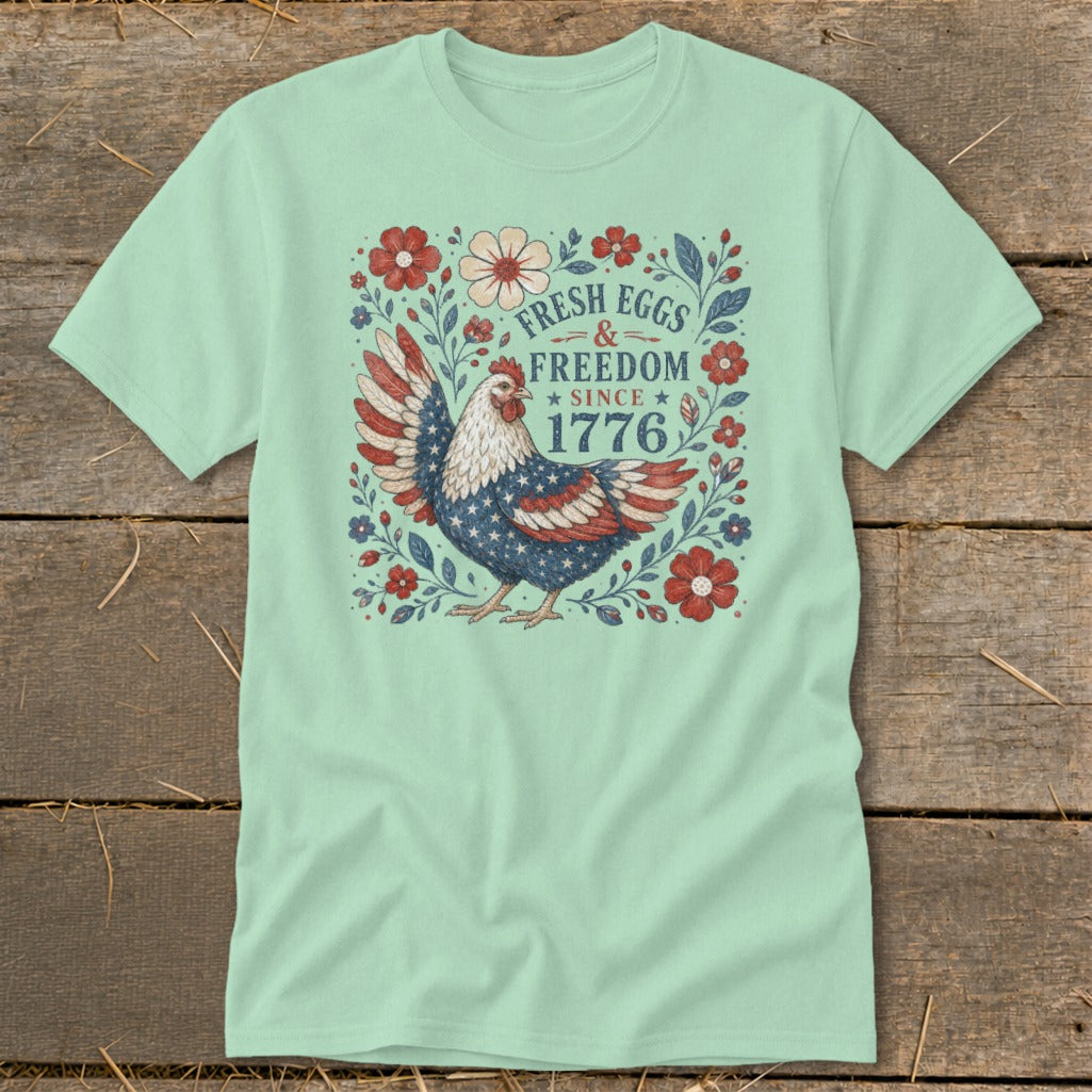 Chicken with American flag wings and "Fresh Eggs & Freedom Since 1776" text.