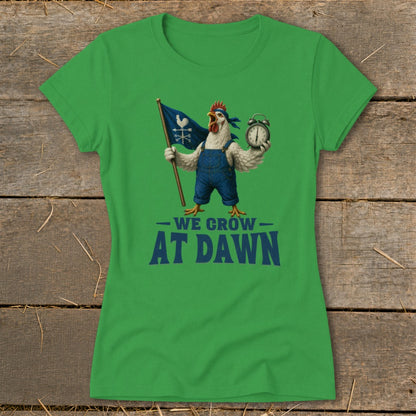 Green t-shirt with chicken holding flag and alarm clock, text reads "WE GROW AT DAWN".