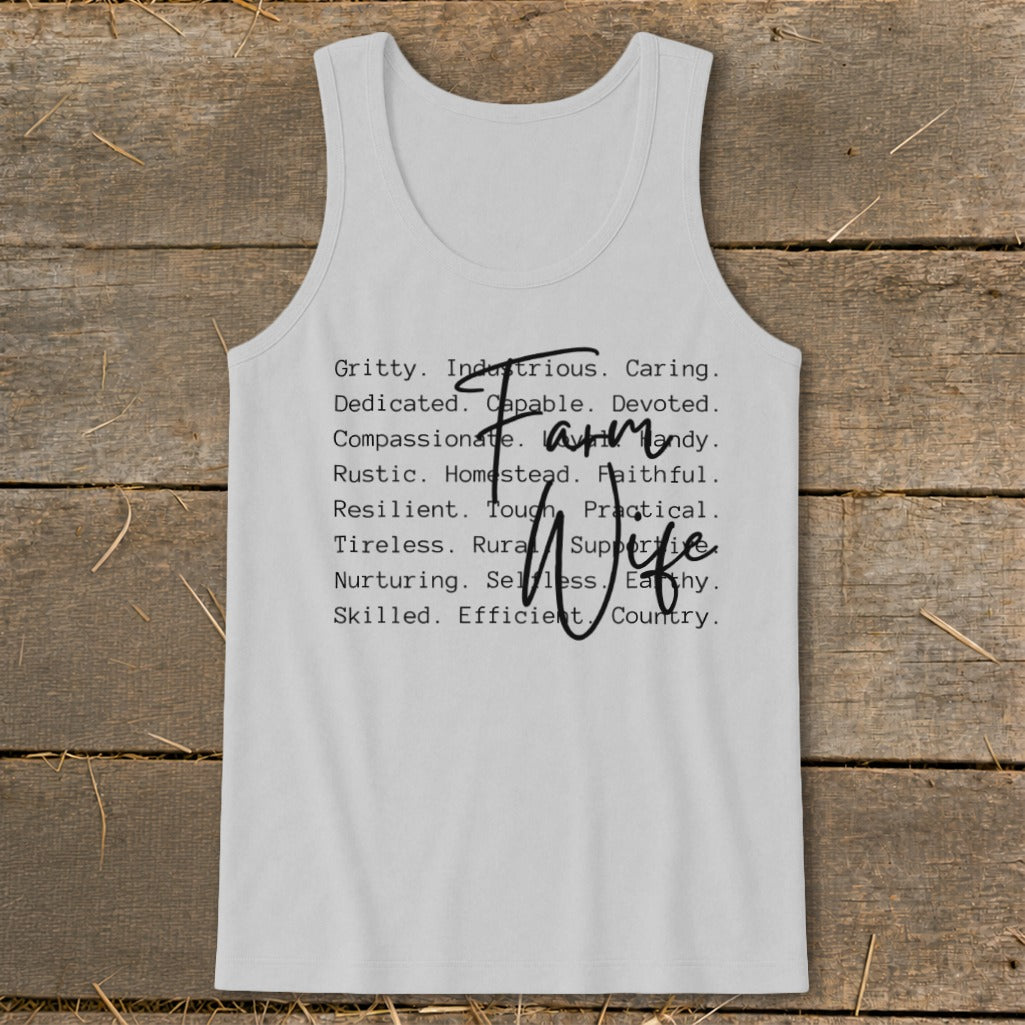 White tank top with "Farm Wife" and descriptive words like Gritty, Caring, and Resilient.