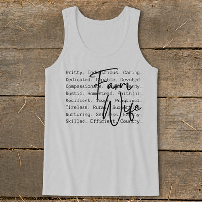 White tank top with "Farm Wife" and descriptive words like Gritty, Caring, and Resilient.