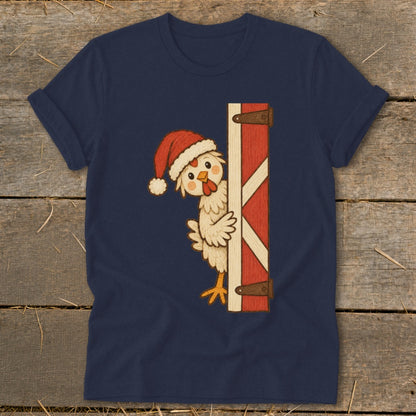 Navy t-shirt with a cartoon chicken wearing a Santa hat peeking from behind a barn door.