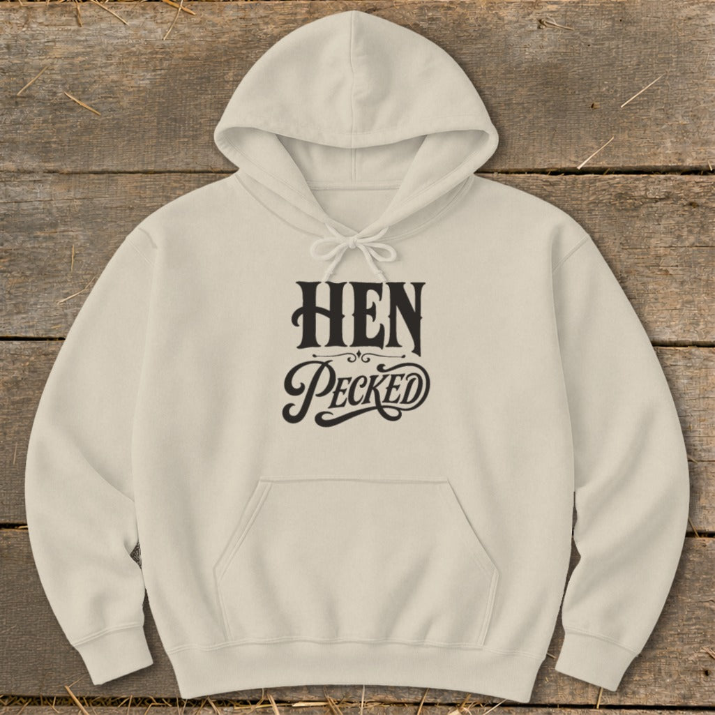 Cream hoodie with "HEN Pecked" text in black, stylized font.