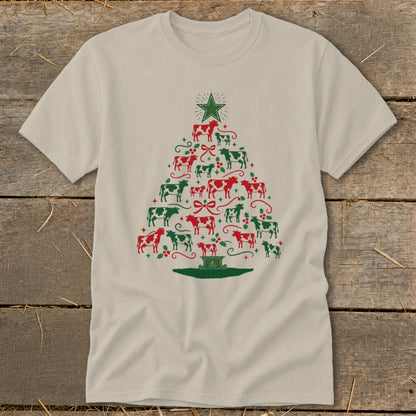 T-shirt with a Christmas tree made of red and green cows and festive accents.