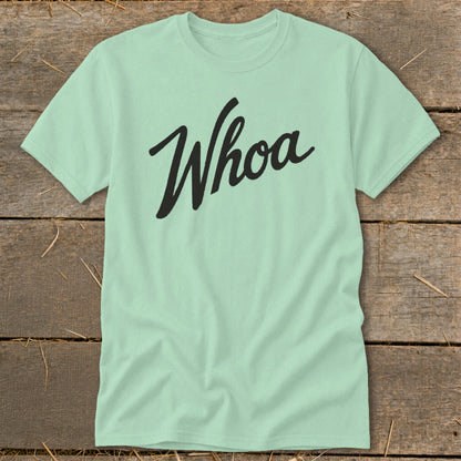 Light green t-shirt with "Whoa" in black script font.