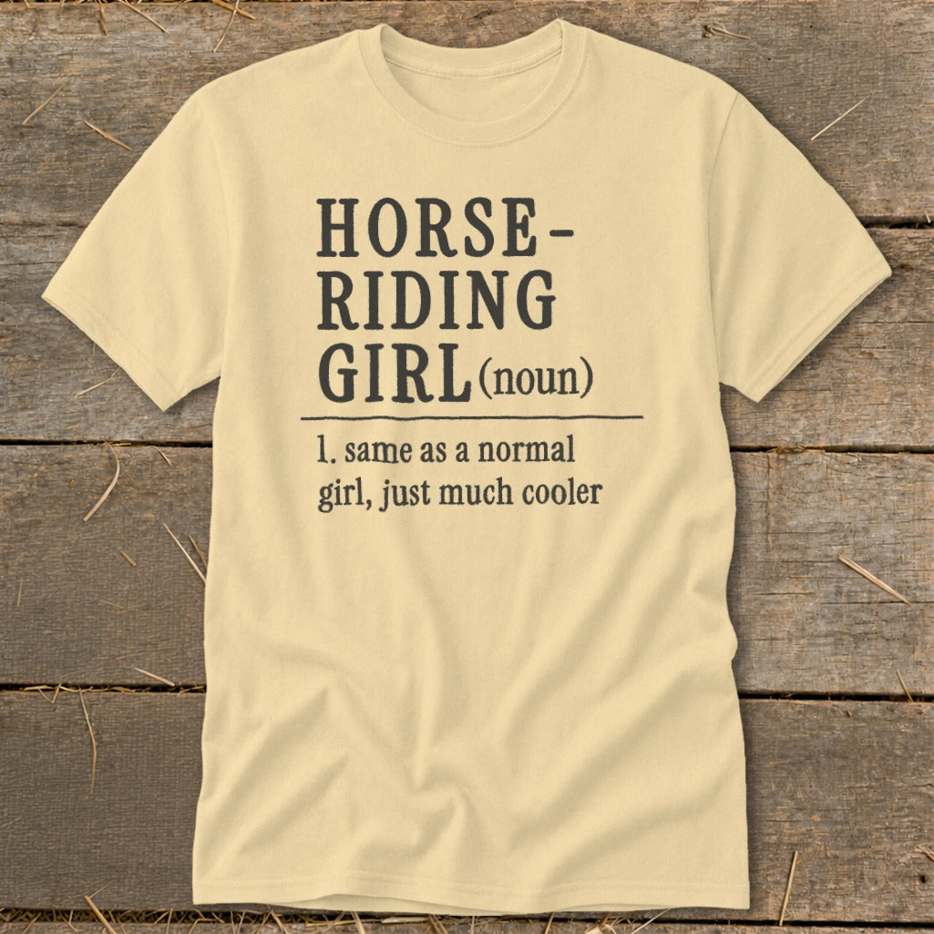 Pale yellow t-shirt with text defining "Horse-Riding Girl."
