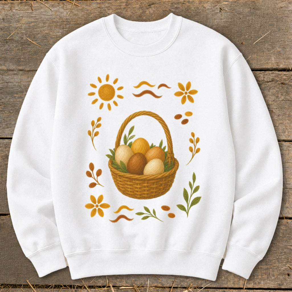 White sweatshirt with Easter basket and spring floral graphic.