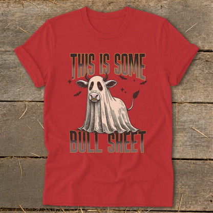Red t-shirt with a ghost-covered cow graphic and the text "THIS IS SOME BULL SHEET".