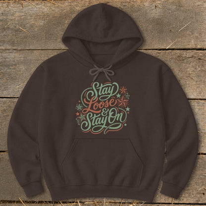 Brown hoodie with "Stay Loose & Stay On" text and decorative elements.