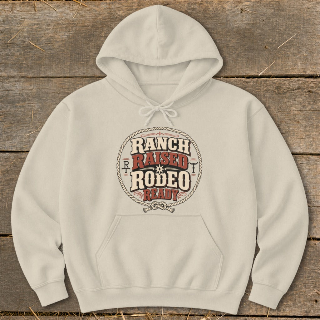 Cream hoodie with "Ranch Raised Rodeo Ready" text graphic in a circle.