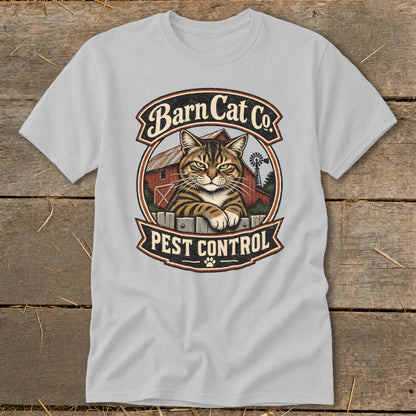 Light gray t-shirt featuring a circular graphic with a tabby cat, barn, and Barn Cat Co. Pest Control text.
