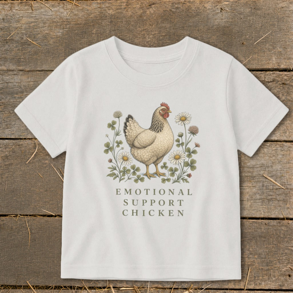 White t-shirt with chicken illustration and text: "Emotional Support Chicken".