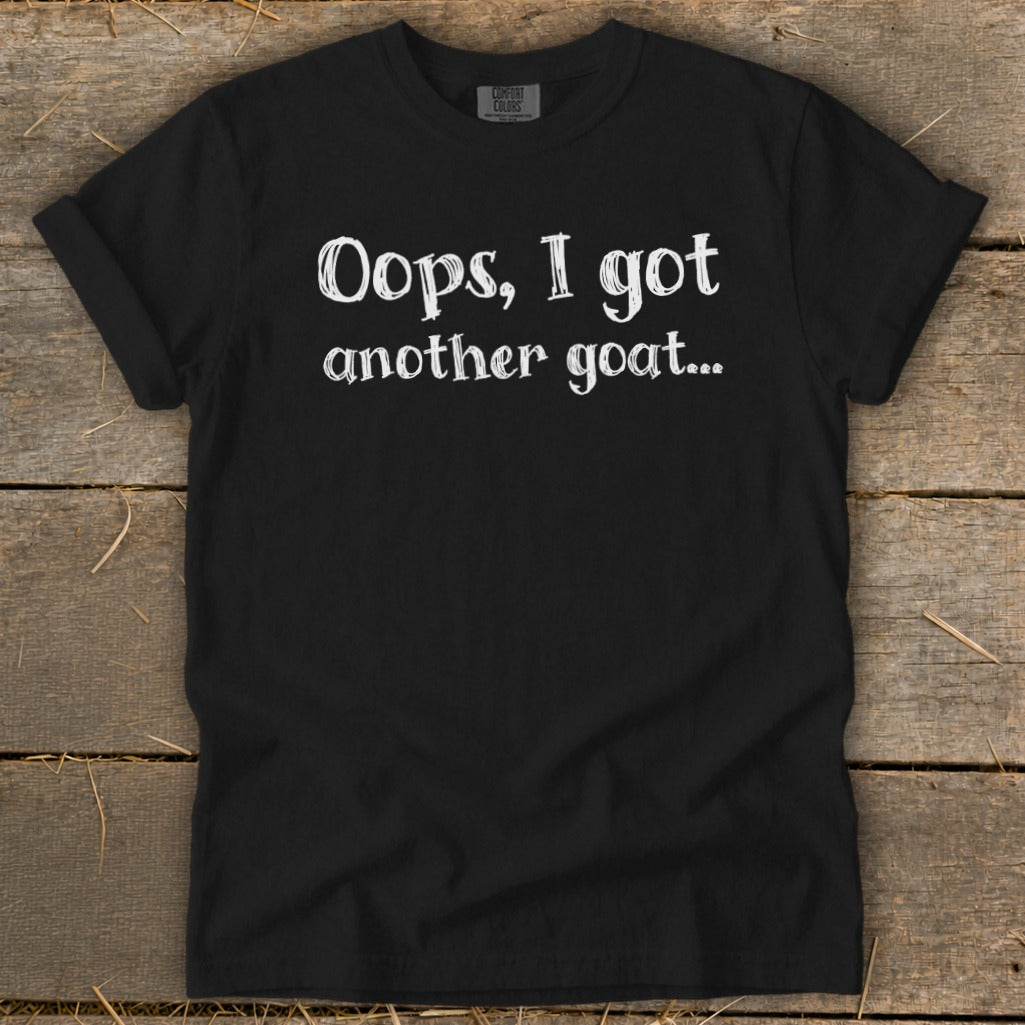 Black t-shirt with white text "Oops, I got another goat..."