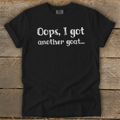 Black t-shirt with white text "Oops, I got another goat..."